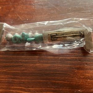 Brand new beaded bracelet with an arrow